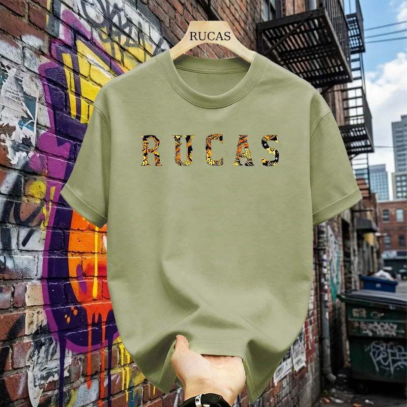 เสื้อยืด RUCAS ดั้งเดิมสําหรับผู้ชายและผู้หญิง - เสื้อยืดสีดํามีโลโก้ RUCAS ลายทอง สตรีทแวร์ Unisex