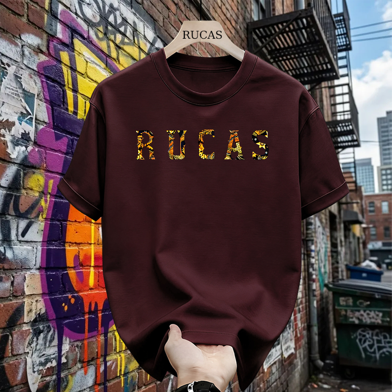 เสื้อยืด RUCAS ดั้งเดิมสําหรับผู้ชายและผู้หญิง - เสื้อยืดสีดํามีโลโก้ RUCAS ลายทอง สตรีทแวร์ Unisex