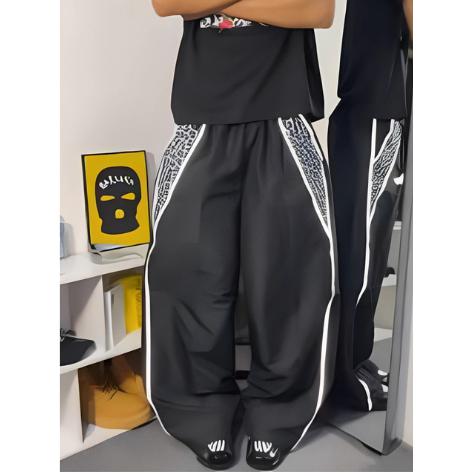 Y2K LIST REFLECTIVE LEOPARD BAGGY PANTS - LEOPARD MOTIF BAGGY PANTS