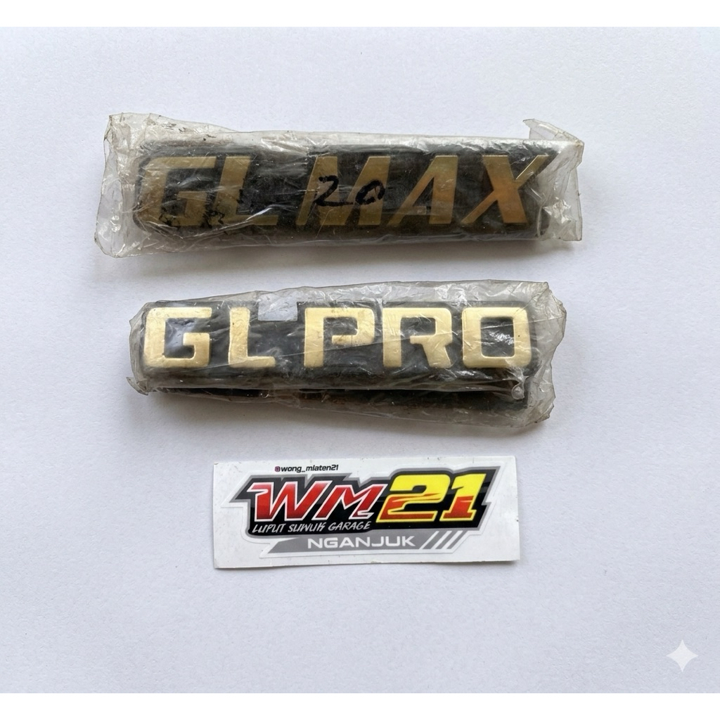 A PAIR OF KEMPOL GL PRO GL MAX EMBLEMS MADE OF ATOM MATERIAL