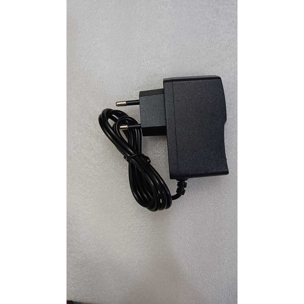 อะแดปเตอร์ AC/DC OUTPUT: 9V 650mA MODEL: 09065 INPUT: AC100-240V 50/60Hz