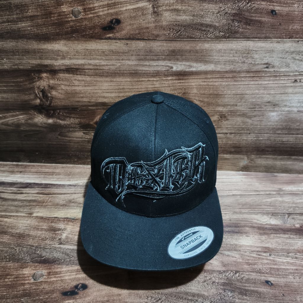 หมวก snapback สีดําโลโก้ Dexter