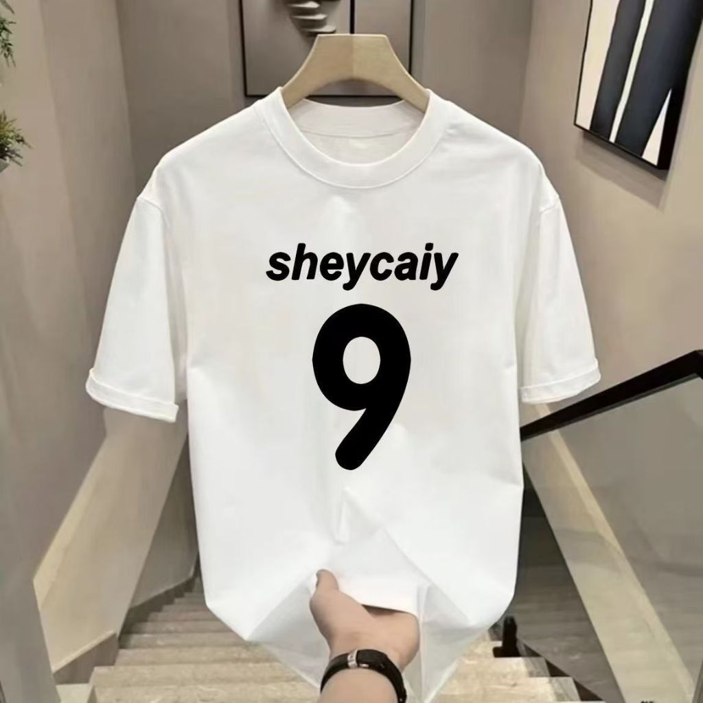 เสื้อยืด Urban Aesthetic Unisex พร้อมข้อความ "shecaiy" & Number 9