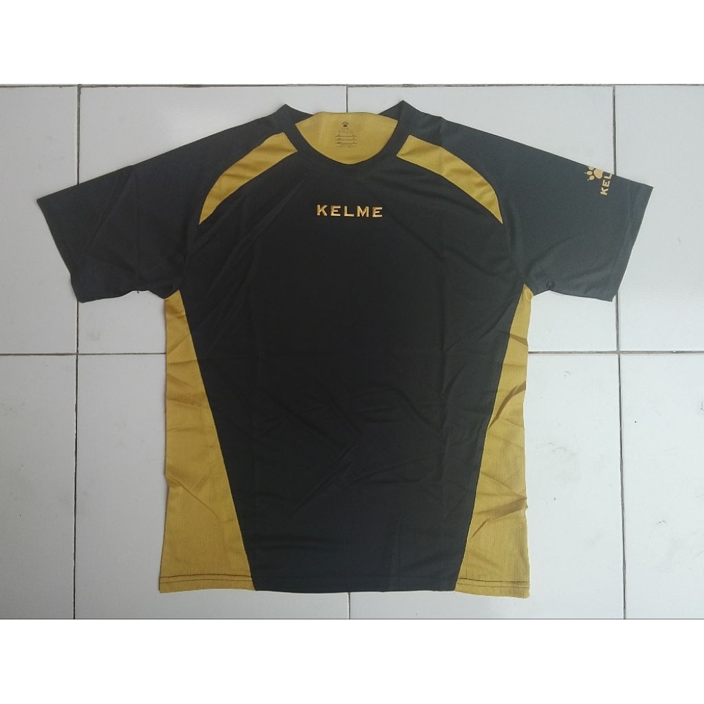 Kelme เสื้อกีฬาวิ่งยิม