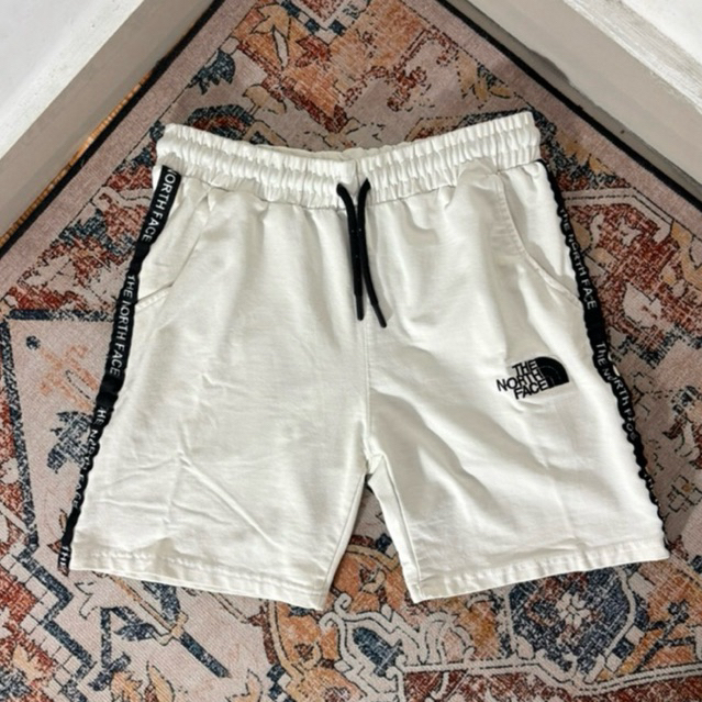 TH33 N00RTH F44C33 SHORTS