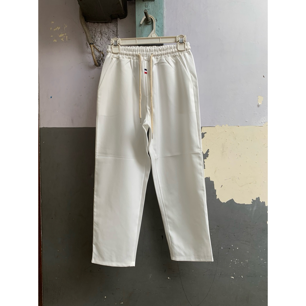 Preloved Tom browne กางเกงขายาวผู้ชายสีขาว