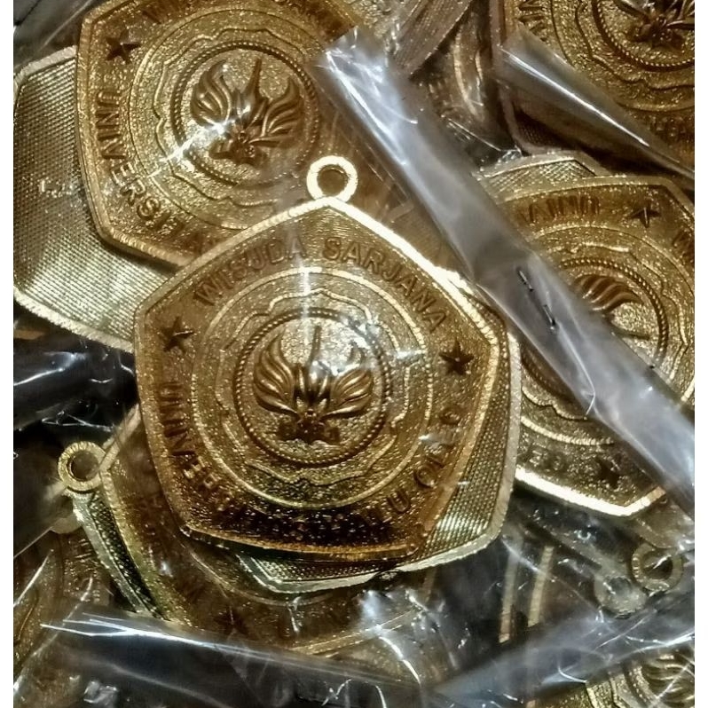 โลโก้รับปริญญา Gordon uho, โลโก้รับปริญญาเหรียญ uho kendari