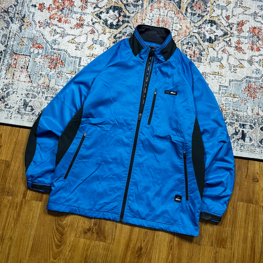 เสื้อแจ็คเก็ต ELLESSE WINDBREAKER