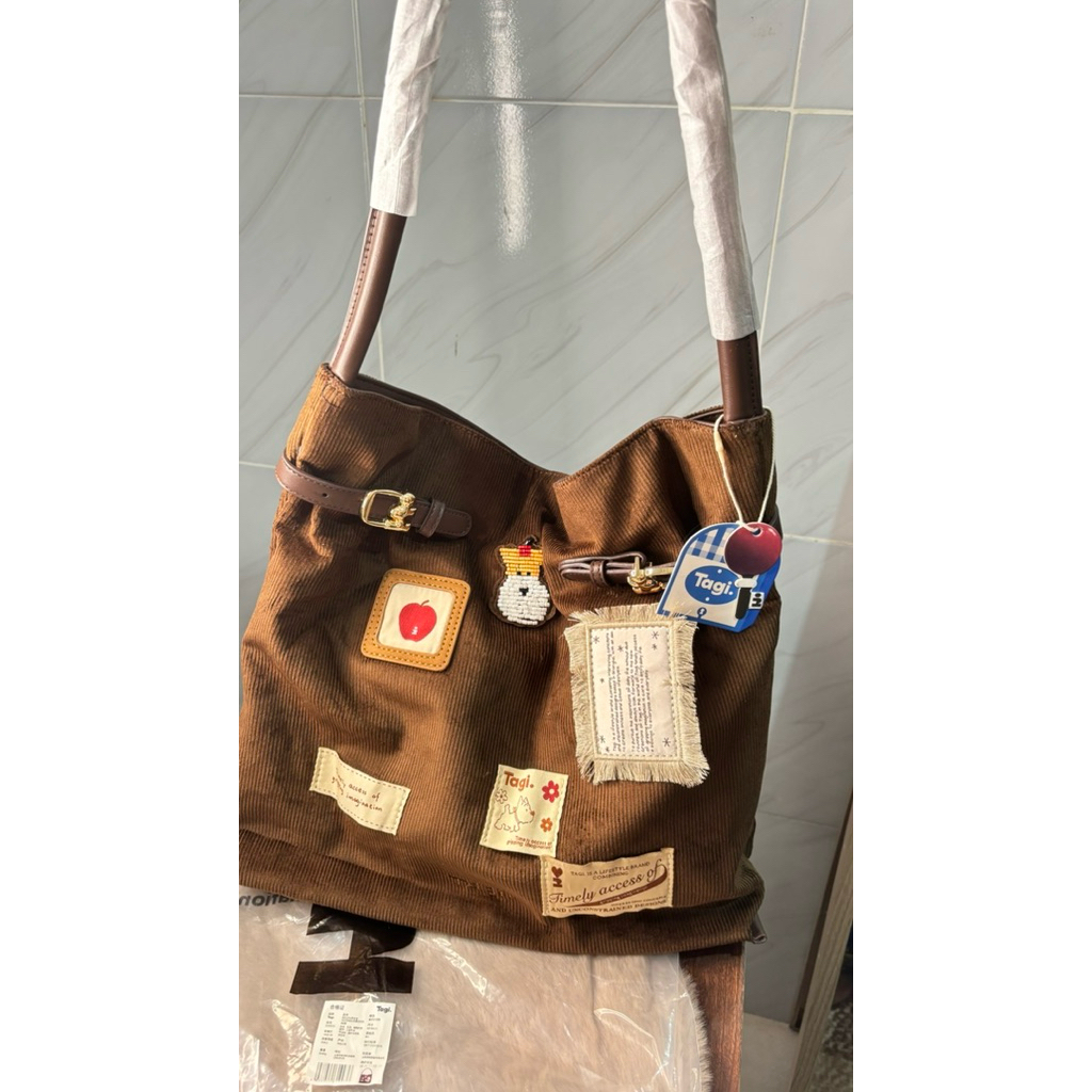 กระเป๋า Tagi********