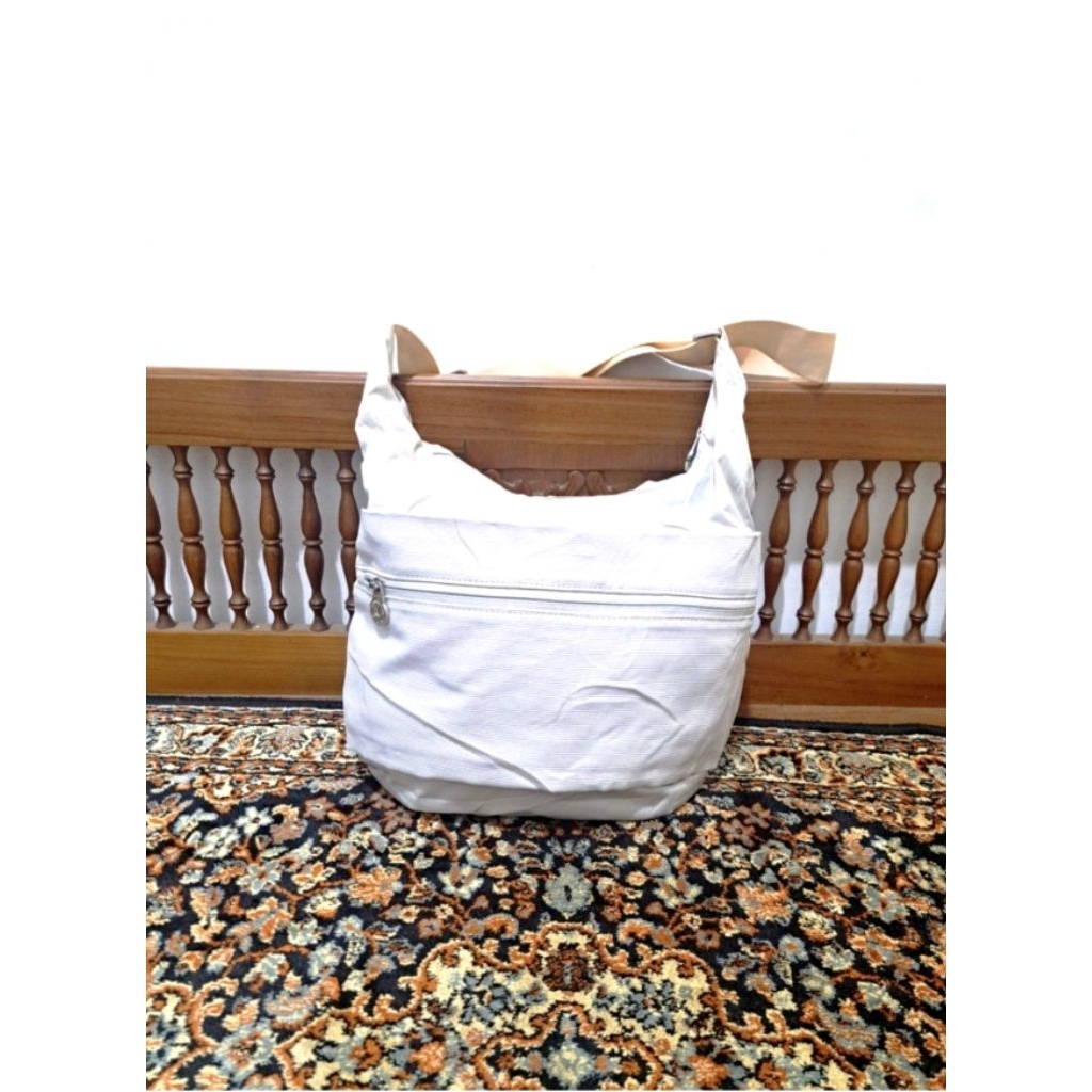 กระเป๋าสะพายข้างสีแดง Samsonite