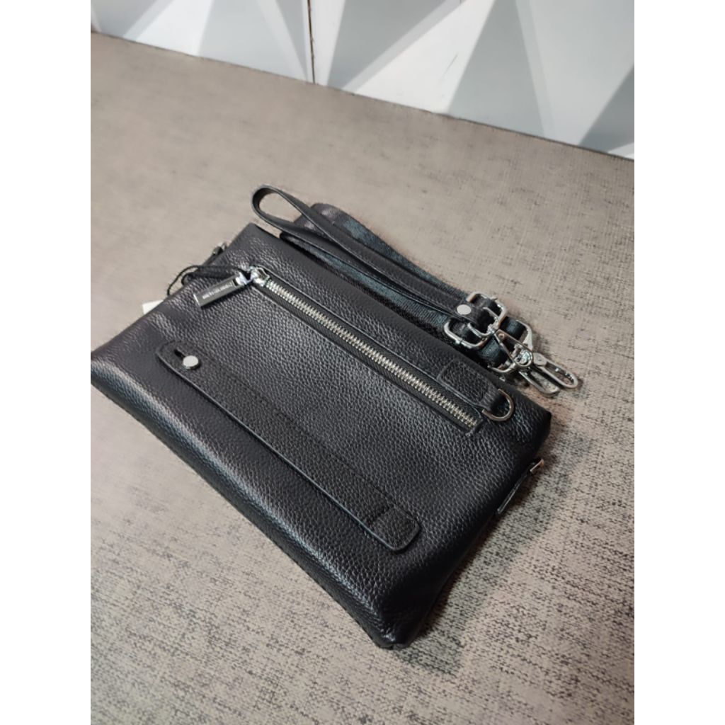 กระเป๋าคลัทช์ vrs หนังแท้