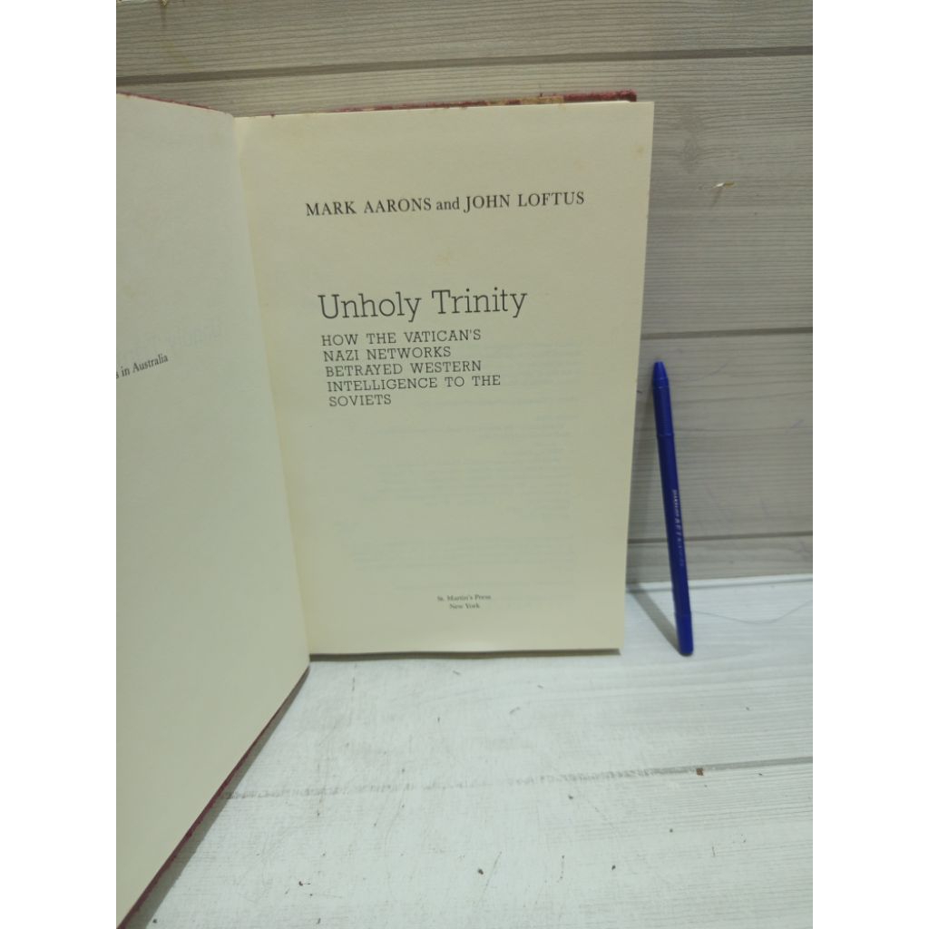 UNHOLY TRINITY BY MARK AARONS และ JOHN LOFTUS