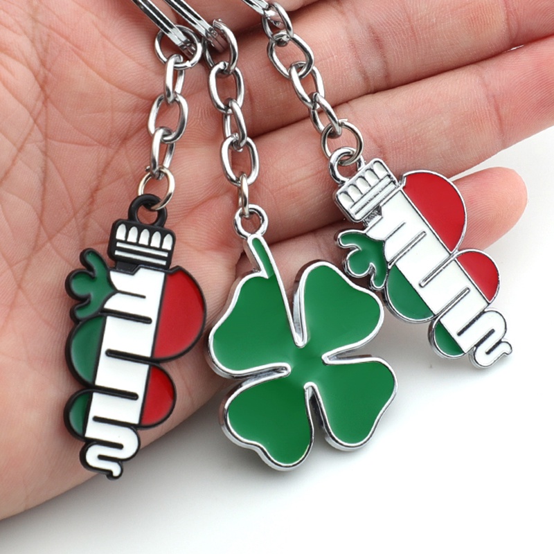 พวงกุญแจรถสีเขียว Four Leaf Clover พวงกุญแจพวงกุญแจแหวนสําหรับ Alfa Romeo 147 156 164 166 159 GT Giulia Giulietta Stelvio