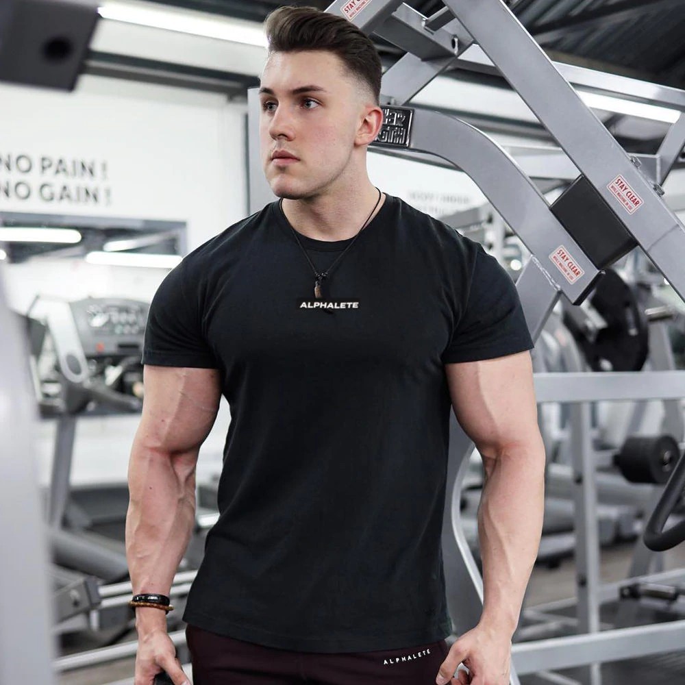 Alphalete USA GYM FITNESS TSHIRT UNISEX ผ้าฝ้ายพรีเมี่ยม 100%