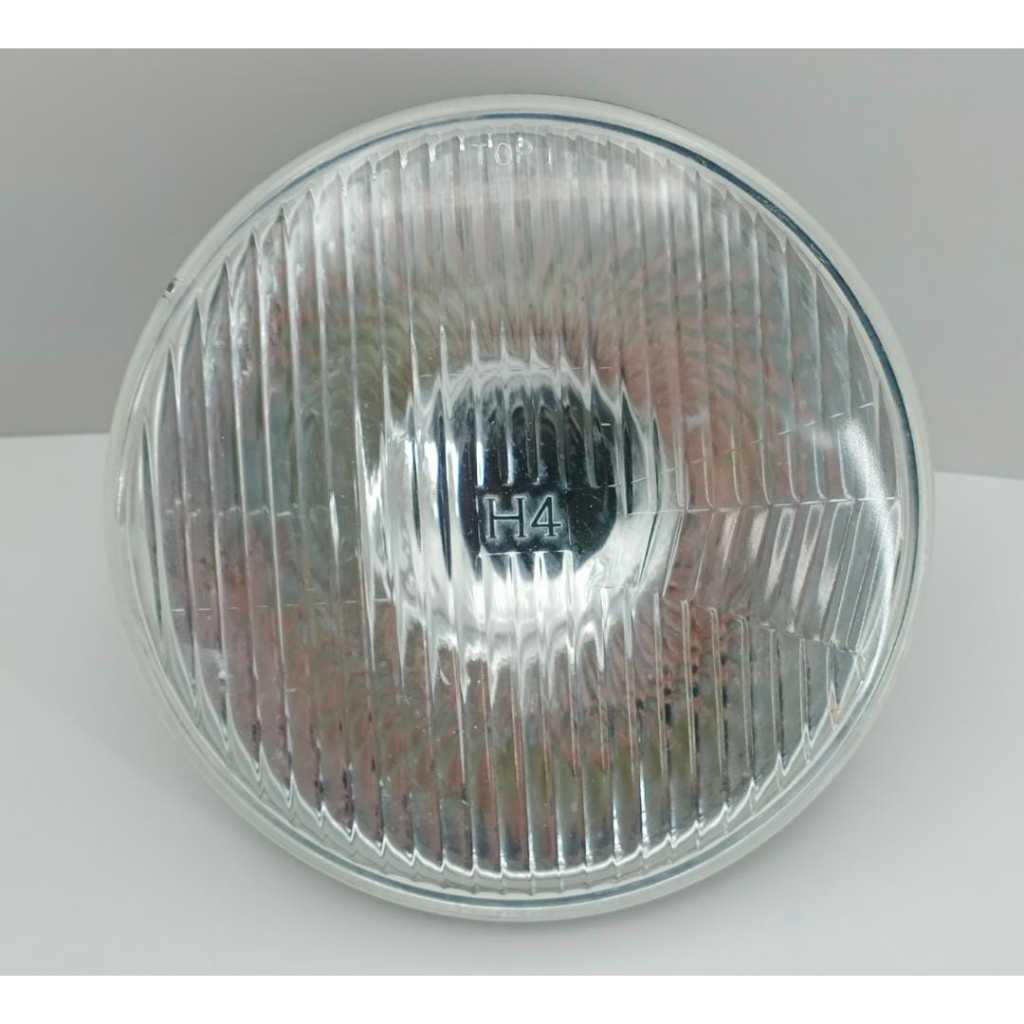 SEAL BEAM 7" ROUND UNIVERSAL H4 TYPE HEAD LAMP KOITO 7010 1 ชิ้น (แก้ว)