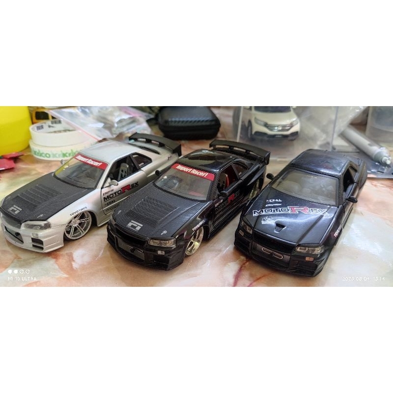 JADA 1/24 1:24 nissan skyline gtr r34 gtr34 motorex รถรุ่น diecast dub city