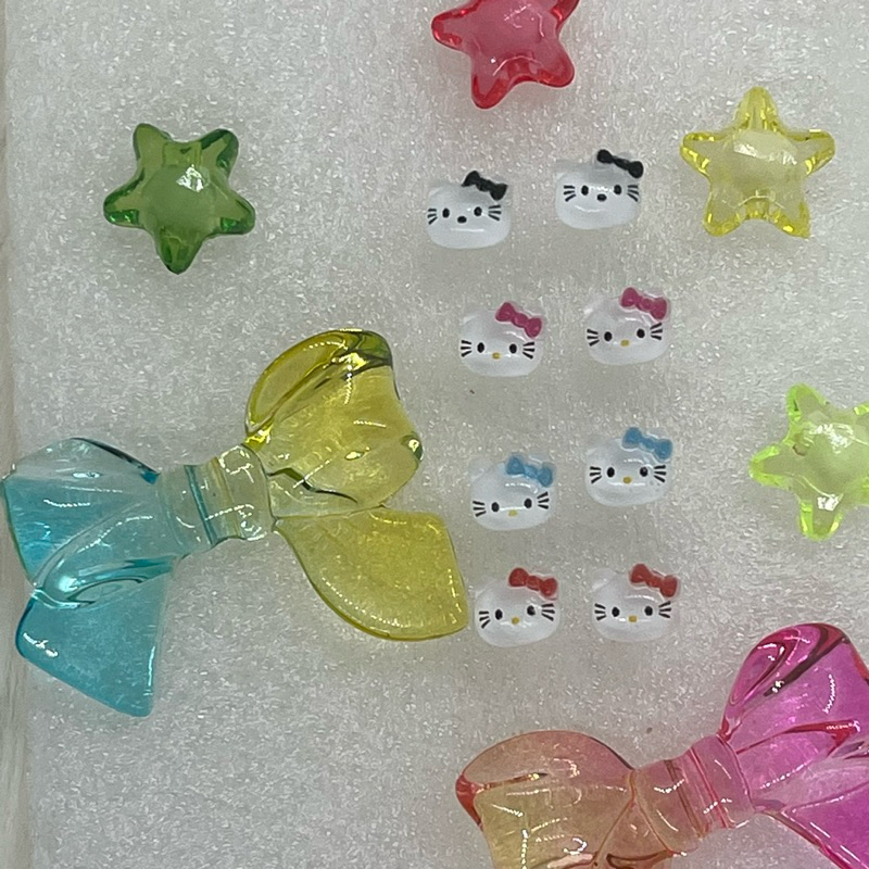^• •  CUSTOM MADE MINI HELLO KITTY EAR STUD / EARING .