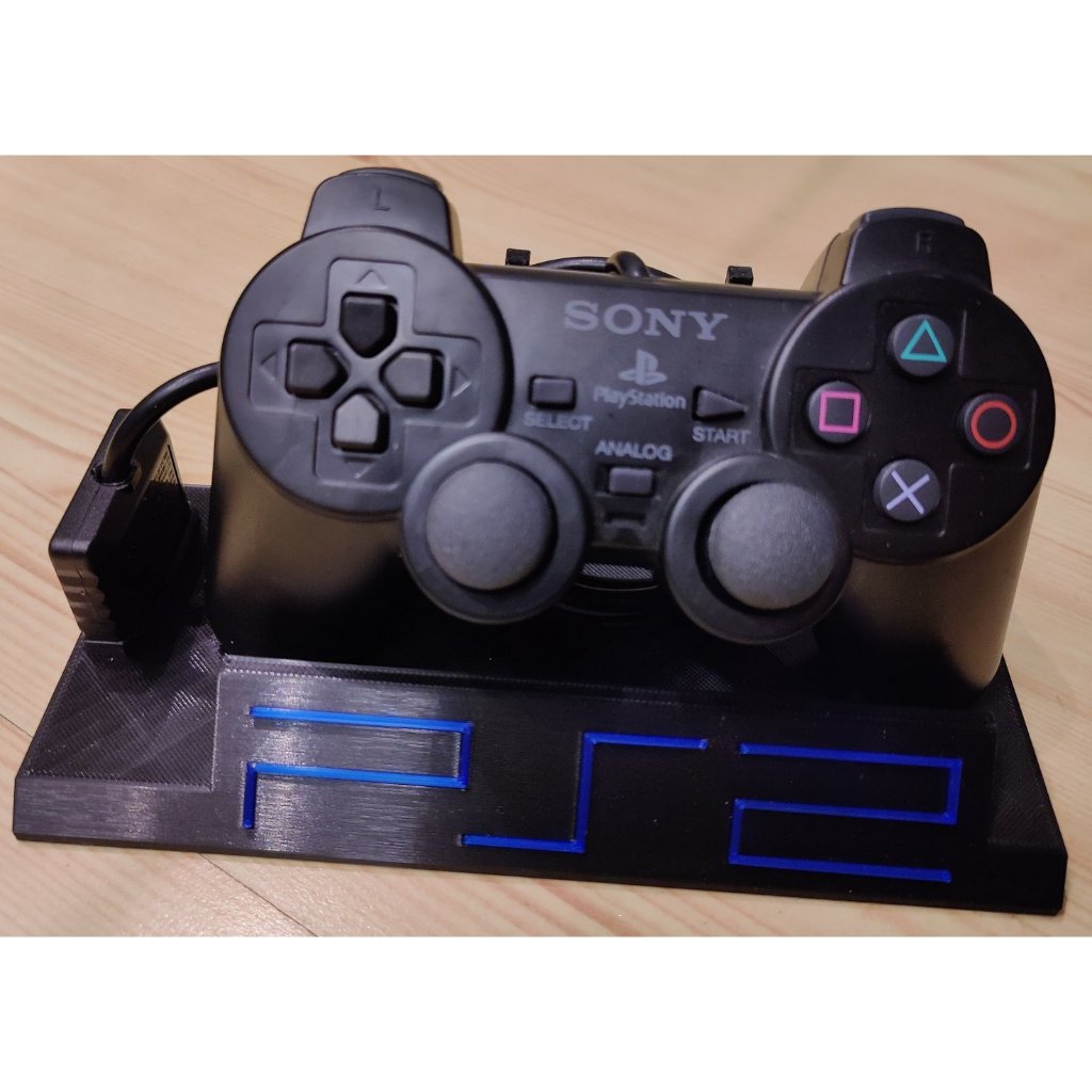 ขาตั้งคอนโทรลเลอร์ PS2 DualShock พร้อมโลโก้ Playstation 2