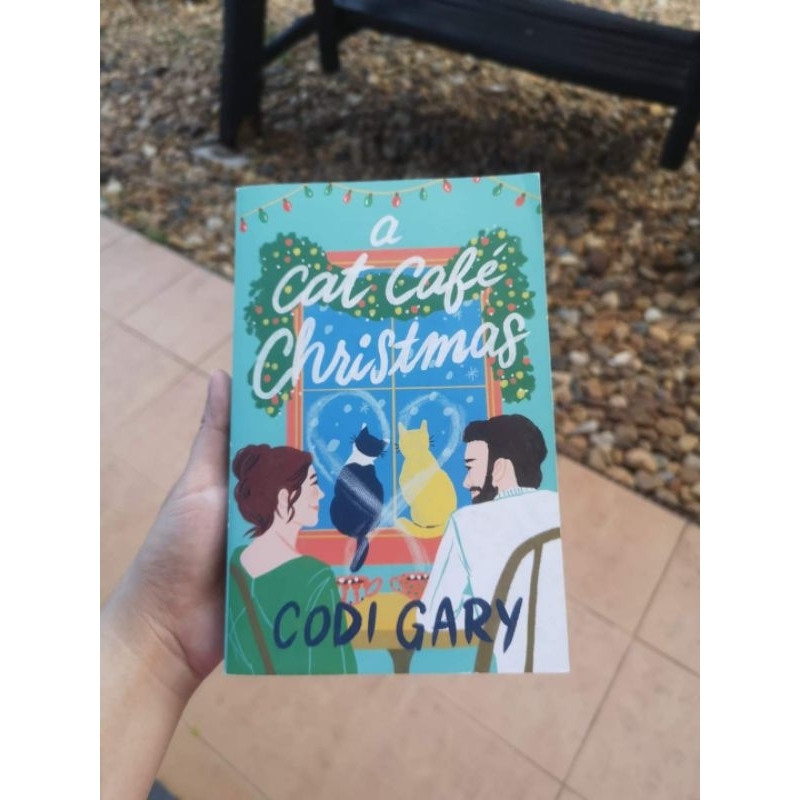 A Cat Cafe Christmas โดย Codi Gary