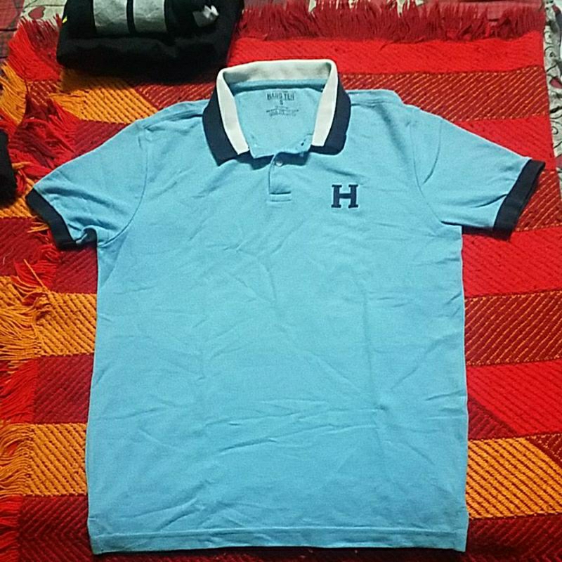 เสื้อโปโล HANG TEN SIZE 20X26 INCI
