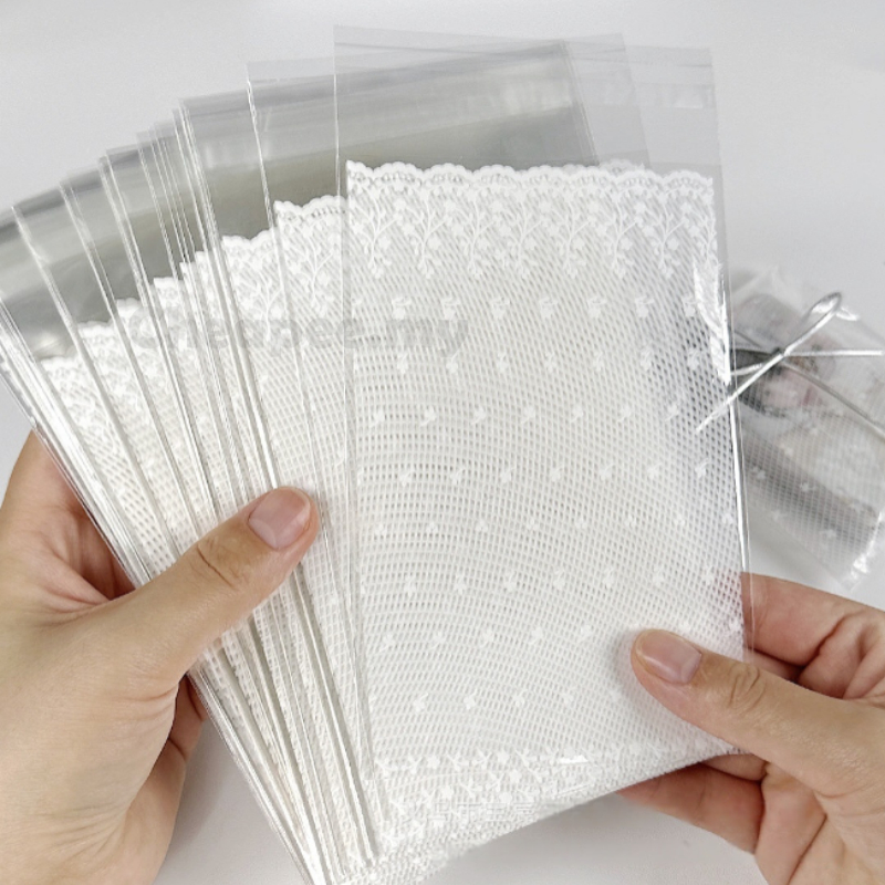 100ชิ้น ทําเอง บรรจุภัณฑ์ถุงกาวในตัว [ลูกไม้สีขาว-ลวดลาย/มีน้ําค้างแข็ง] 礼品包装自粘袋 [白色丝/时尚白色บด]