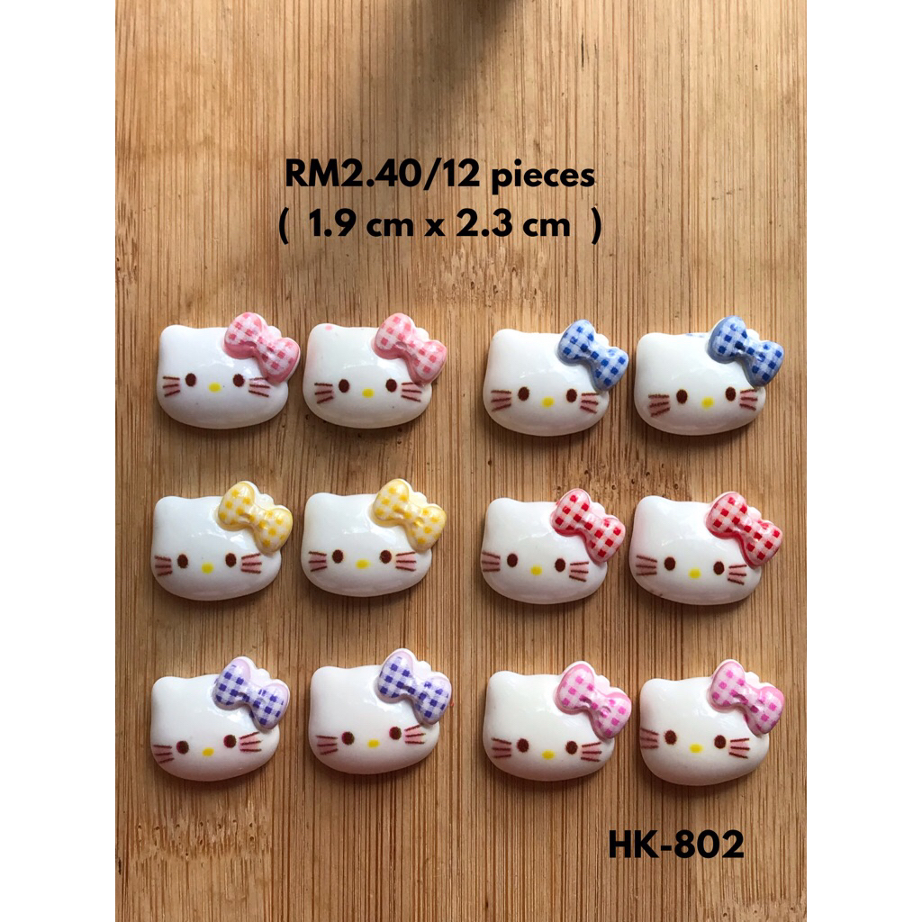 RM2.40/12 ชิ้น @ 20 เซ็นต์ : HK-802 - เรซิ่น - HK - Glossy - 1.9 cm x 2.2 cm