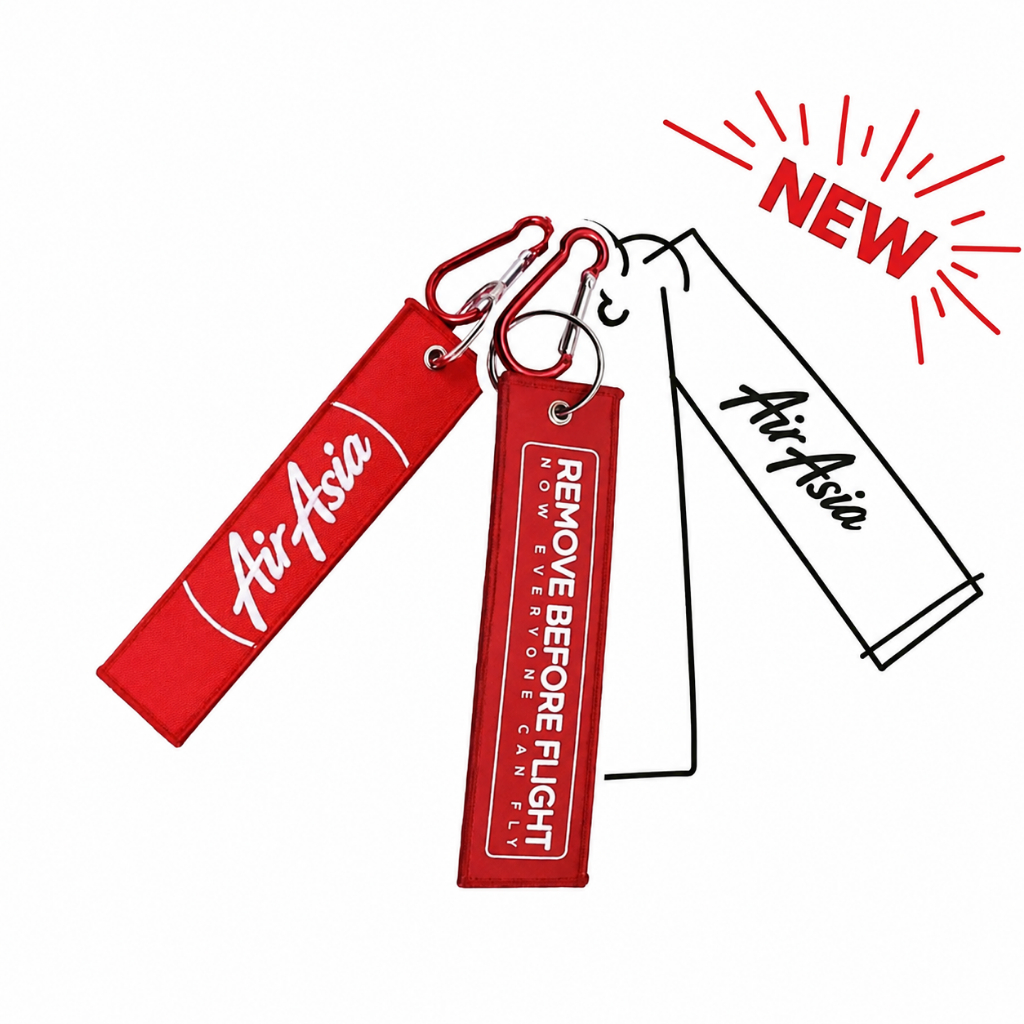 พวงกุญแจ AirAsia "Remove Before Flight"