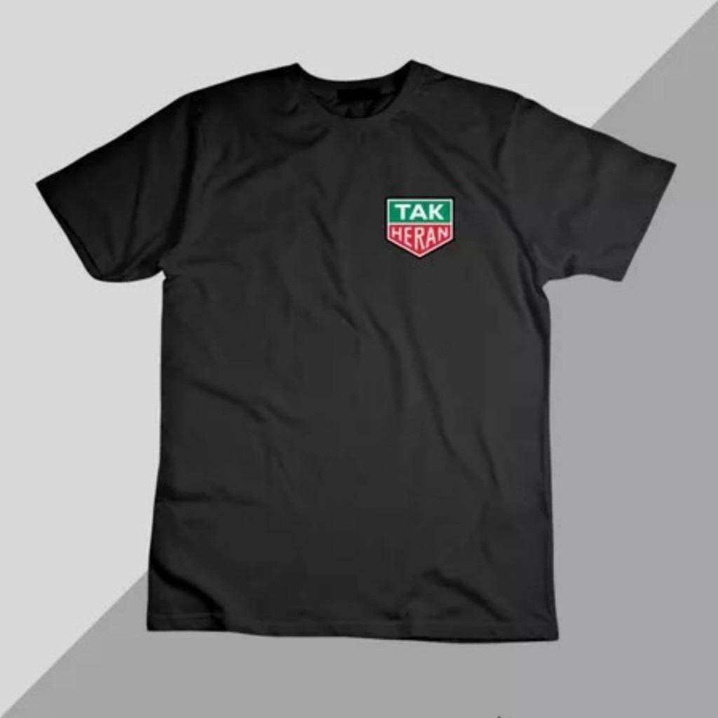 เสื้อยืดโอเวอร์ไซส์ Tak Heran Shield Badge Logo Chest Front Print เสื้อยืดแขนสั้น Unisex