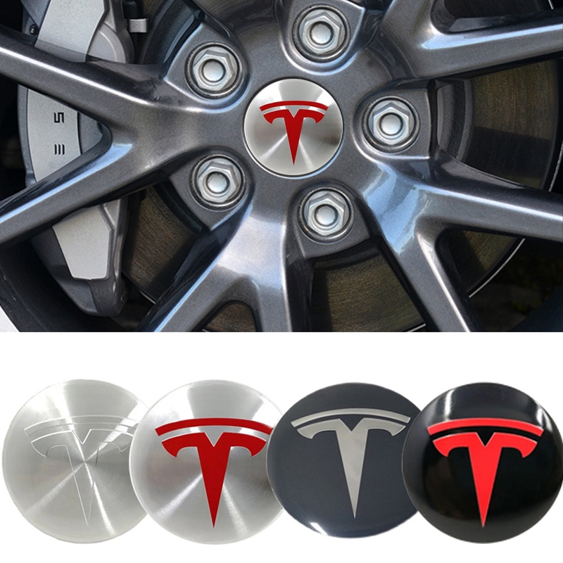4PCS 56 มม.รถล้อ Hub Center สติกเกอร์สัญลักษณ์จัดแต่งทรงผมสําหรับ Tesla Model3 รุ่น S Roadster Cybertuck ModelX Auto อุปกรณ์เสริม
