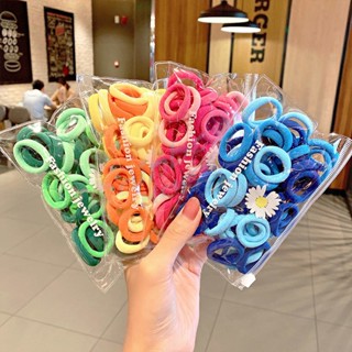 Rainbow ที่รัดผมเด็ก ที่รัดผมไนลอน สีสันสดใส  สีลูกกวาด 50 เส้น / ซอง childrens hair tie