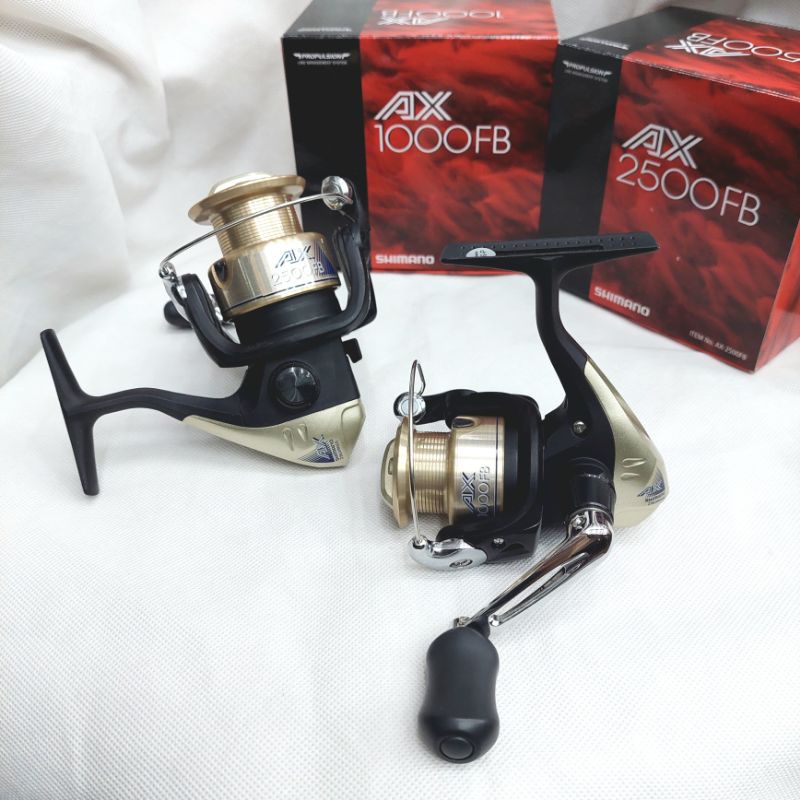 รอกตกปลา SHIMANO # AX 1000 / 2500 FB