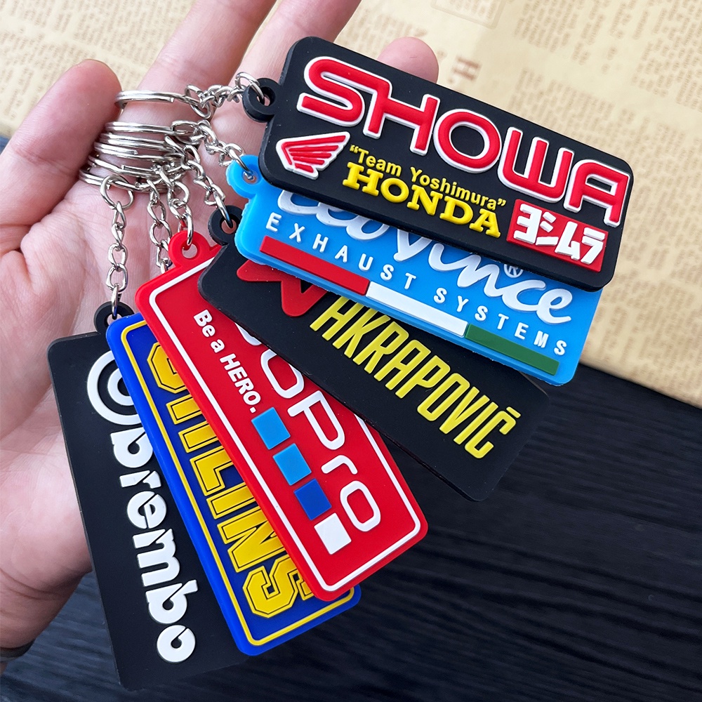 พวงกุญแจยาง 3D สองด้าน สร้างสรรค์ สําหรับรถจักรยานยนต์ Brembo OHLINS GoPro Agip TRD Akrapovic Leovin