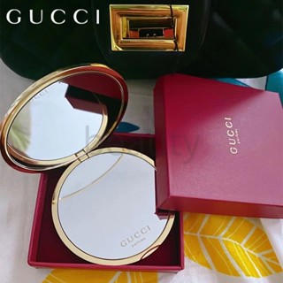 จัดส่งที่รวดเร็ว⚡GUCCI สีทองกระจกสองด้าน กระจกกลม กระจกพกพาขนาดเล็ก กระจกโต๊ะเครื่องแป้ง พับกระจกสองด้าน อุปกรณ์แต่งหน้า