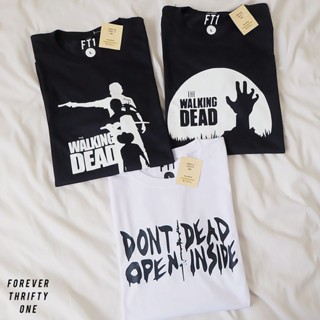 เสื้อครอปสายฝอ เสื้อขาว THE WALKING DEAD TWD เสื้อยืดเชิ้ตผู้ชายเสื้อยืด Unisex ผู้หญิง [hJ เสื้อคู่