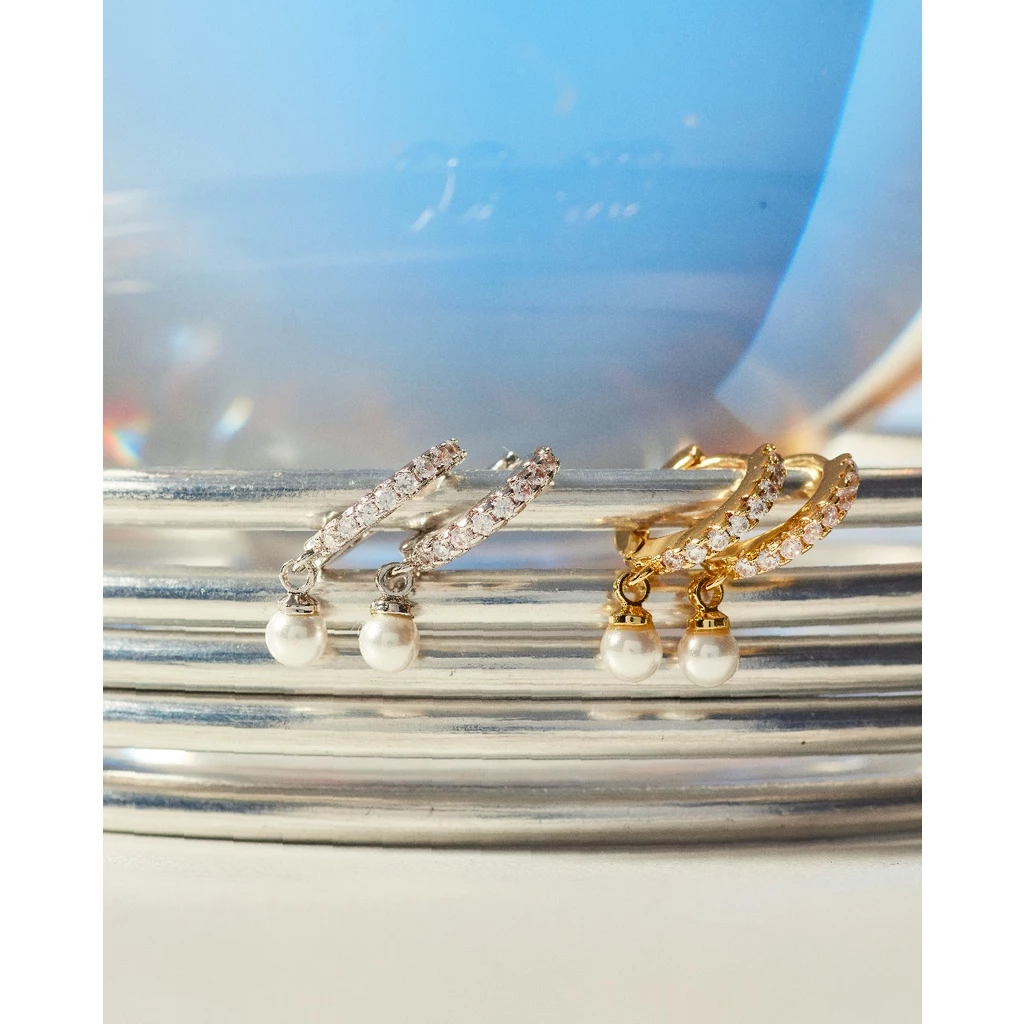 Julys - ivory huggie earrings