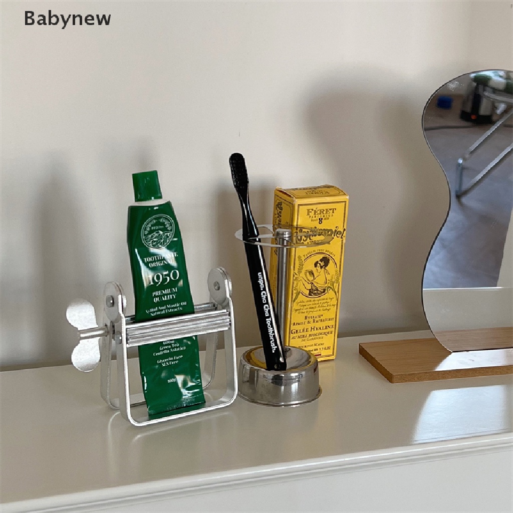 <Babynew> ที่บีบยาสีฟัน ครีม ซอส แบบสเตนเลสสตีล ของใช้ในครัวเรือน ห้องน้ํา ชั้นวางแปรงสีฟัน วางฟัน ลดราคา