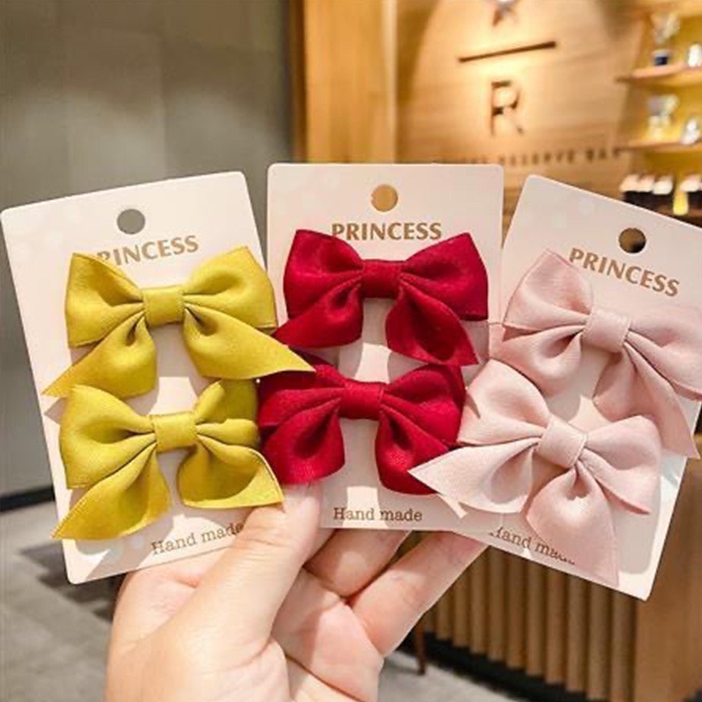 [พร้อมส่งจากไทย] กิ๊บติดผม ประดับโบว์น่ารัก สีพื้น สไตล์เกาหลี สําหรับเด็กผู้หญิง จํานวน 2 ชิ้น A002