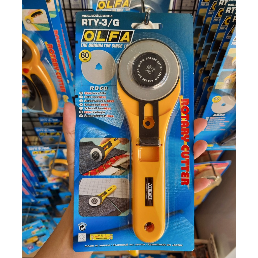 OLFA มีดคัตเตอร์โรตารี่ RTY-3/DX ขนาด 60 มม.ระบบ Safety lock งานตัดผ้า หนัง ตัดวัสดุบางได้ถึง 8 ชั้น