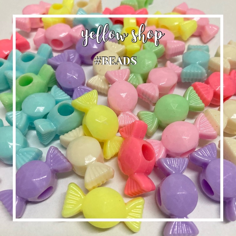 ลูกปัดแฟนซีลายลูกกวาดสีหวาน ขนาด 11*24 มิล (1 ถุงมี 20 เม็ดคละสี)