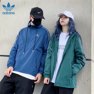 Adidas ของแท้ เสื้อแจ็กเก็ต เสื้อคาร์ดิแกน กันลม มีฮู้ด ทรงหลวม สไตล์สปอร์ต เรียบง่าย สําหรับผู้ชาย คู่รัก