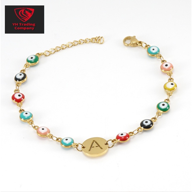Y.H สร้อยข้อมือสเตนเลส ไทเทเนียม 18K จี้ตาชั่วร้าย ทรงกลม ลายตัวอักษร สีตุรกี สําหรับผู้หญิง