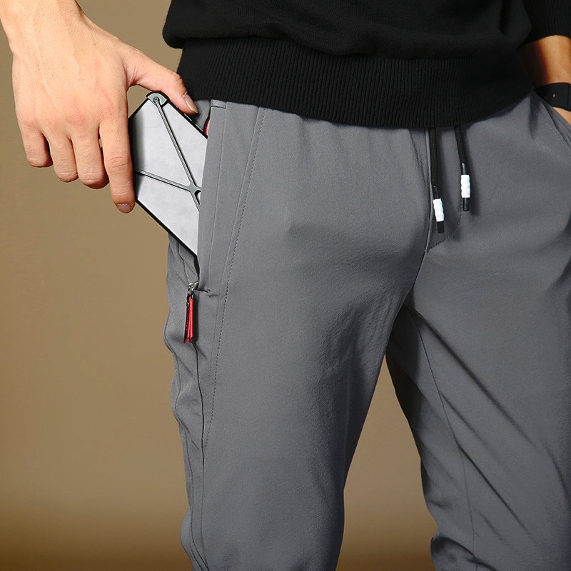 ⚡จัดส่งทุกวัน⚡กางเกงผู้ชายผ้าบางเย็นสบาย ยืดหยุ่น ระบายอากาศ แบบเรียบหรู เวอร์ชันเกาหลี ️