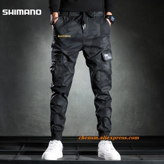 SHIMANO ใหม่ กางเกงกีฬา กางเกงตกปลาลําลอง ระบายอากาศ แห้งเร็ว กันน้ํา ทรงหลวม มีหลายกระเป๋า เหมาะกับฤดูใบไม้ผลิ ฤดูร้อน สําหรับผู้ชาย