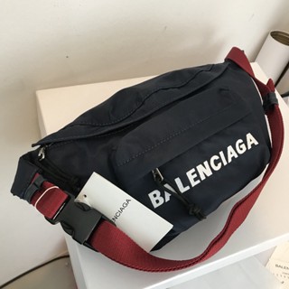 BALENCIAGA BLUE WHEEL BELT BAG กระเป๋าคาดอก คาดเอว แบรนด์บาลองเซียก้า สีกรมท่า สายคาดสีแดง ปักตัวหนังสือโลโก้