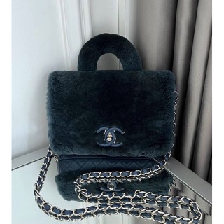 Like new Chanel fur with  handle