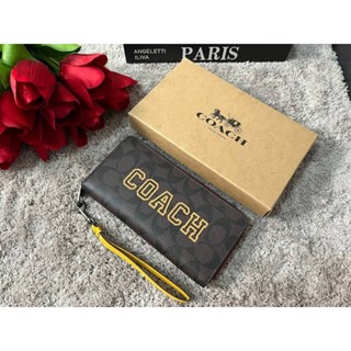 COACH CB865 LONG ZIP AROUND WALLET IN SIGNATURE CANVAS WITH VARSITY MOTIF