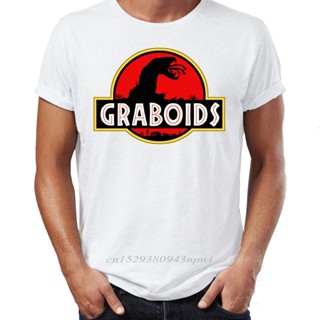 เสื้อยืดผ้าฝ้ายพิมพ์ลายแฟชั่น ใหม่ เสื้อยืดผ้าฝ้าย 100% พิมพ์ลาย Jurassic Graboids Tremors Cult Classic Artsy Awesome โอ