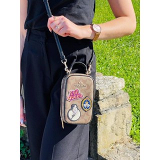 กระเป๋าสะพายcrossbody ลายใหม่ สวยมากกDisney X Coach Eva Phone Crossbody In Signature Canvas With Patches