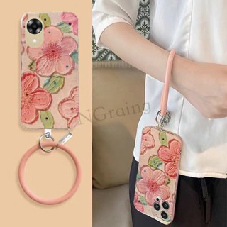 พร้อมส่ง เคสโทรศัพท์มือถือ ซิลิโคนนิ่ม TPU กันตก ป้องกันเลนส์กล้อง ลายดอกไม้ ประดับพลอยเทียม พร้อมสายรัดข้อมือ สําหรับ Oppo A17k