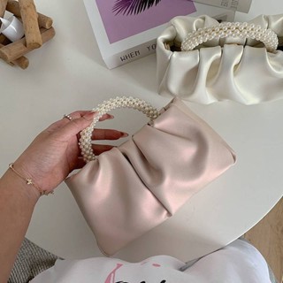 กระเป๋าหนังสีเหลือบมุกวาว หูถือมุก มีสายสะพายยาวปรับระดับได้